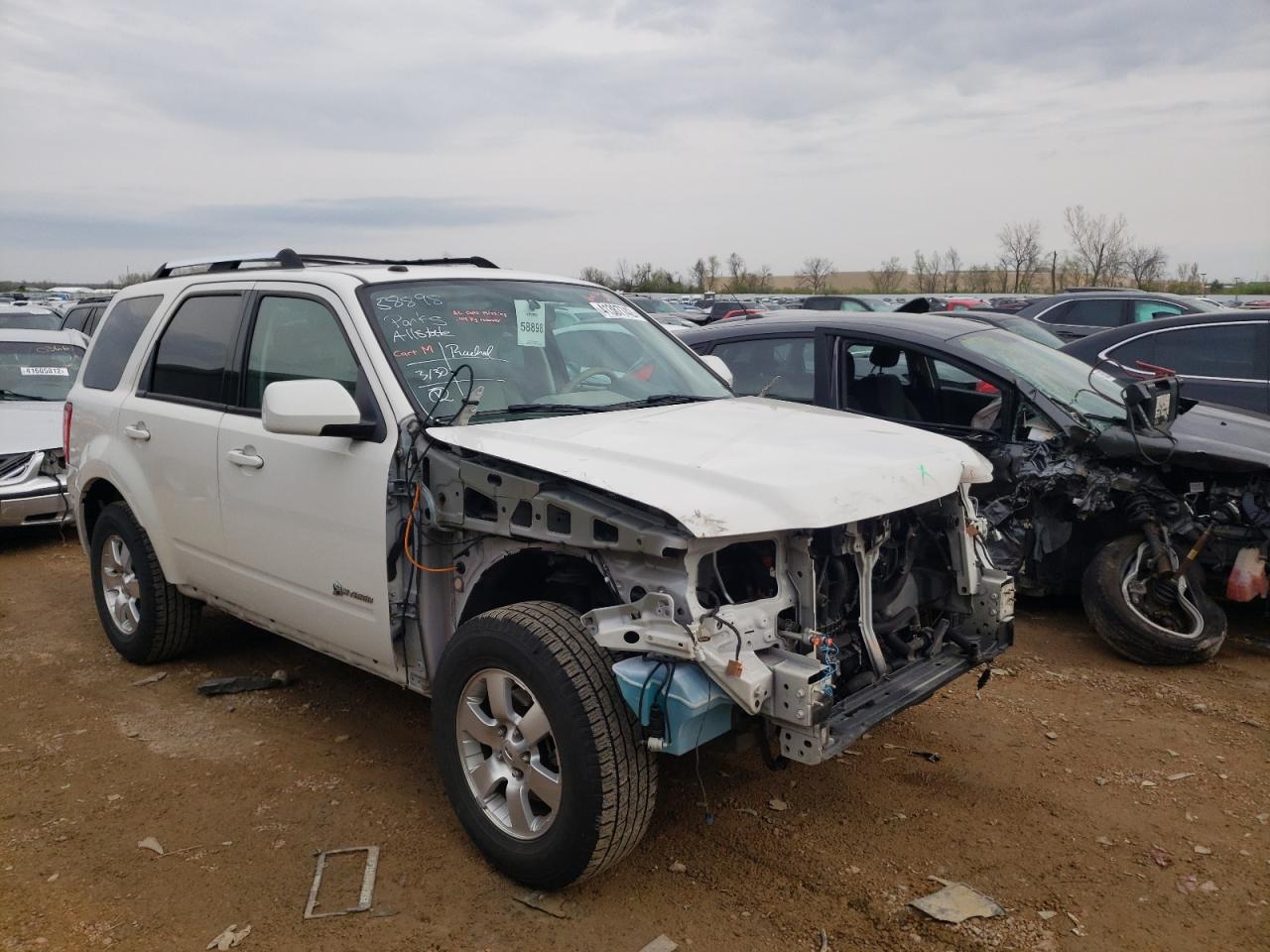 FORD ESCAPE HYB 2010 with VIN 1FMCU4K32AKC62829 - Photo from auction