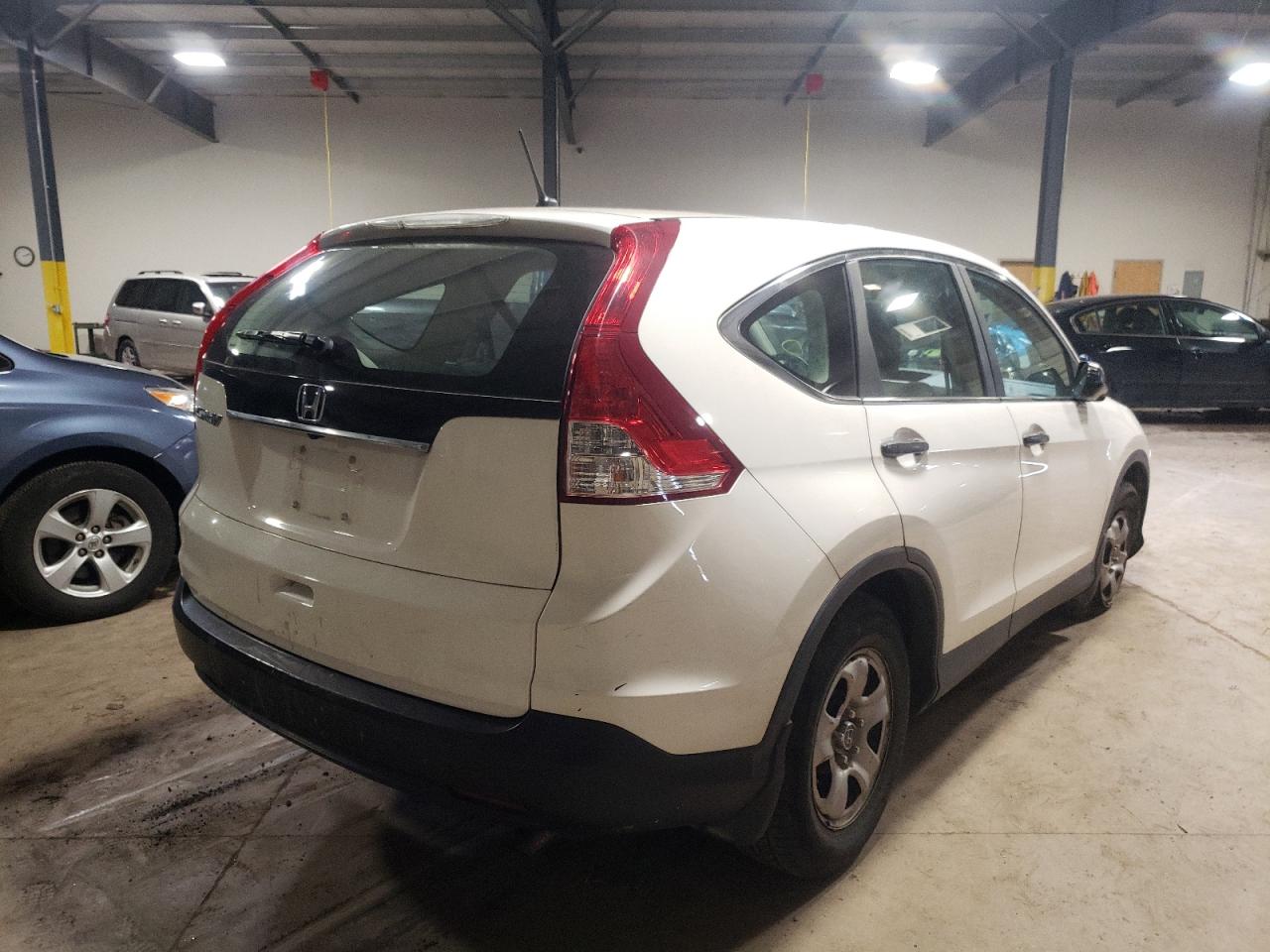 Photo 4 from auction – 2012 HONDA CR-V LX with VIN 5J6RM3H37CL036244