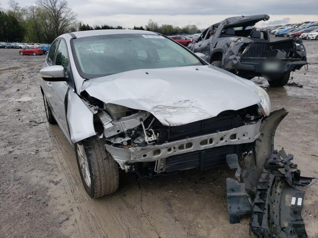 Photo 9 from auction – 2012 FORD FOCUS with VIN 1FAHP3M23CL472522