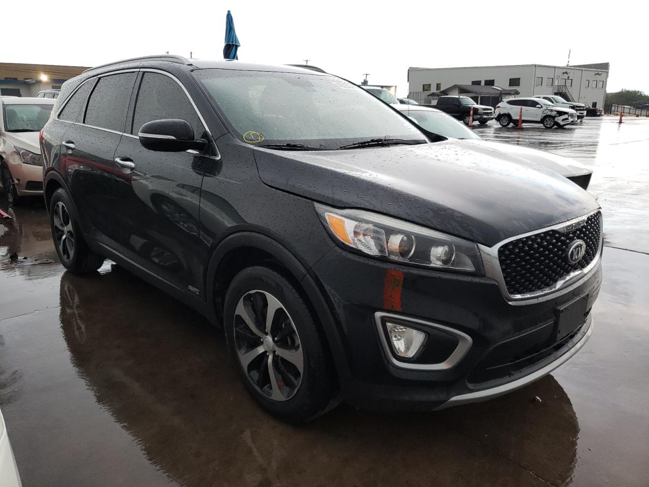 KIA SORENTO EX 2016 with VIN 5XYPHDA19GG180640 - Photo from auction