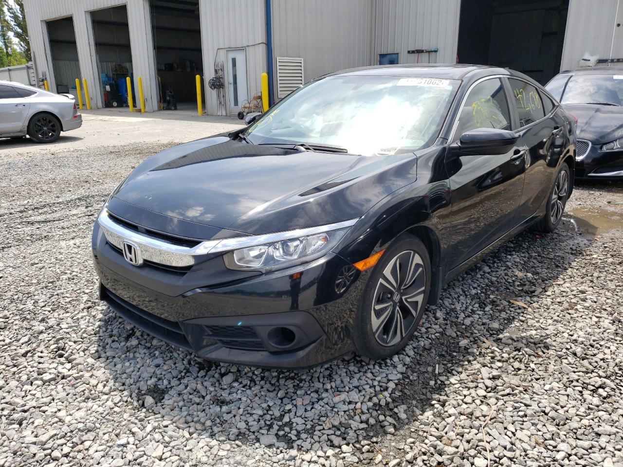 Photo 2 from auction – 2018 HONDA CIVIC EX with VIN JHMFC1F34JX029534
