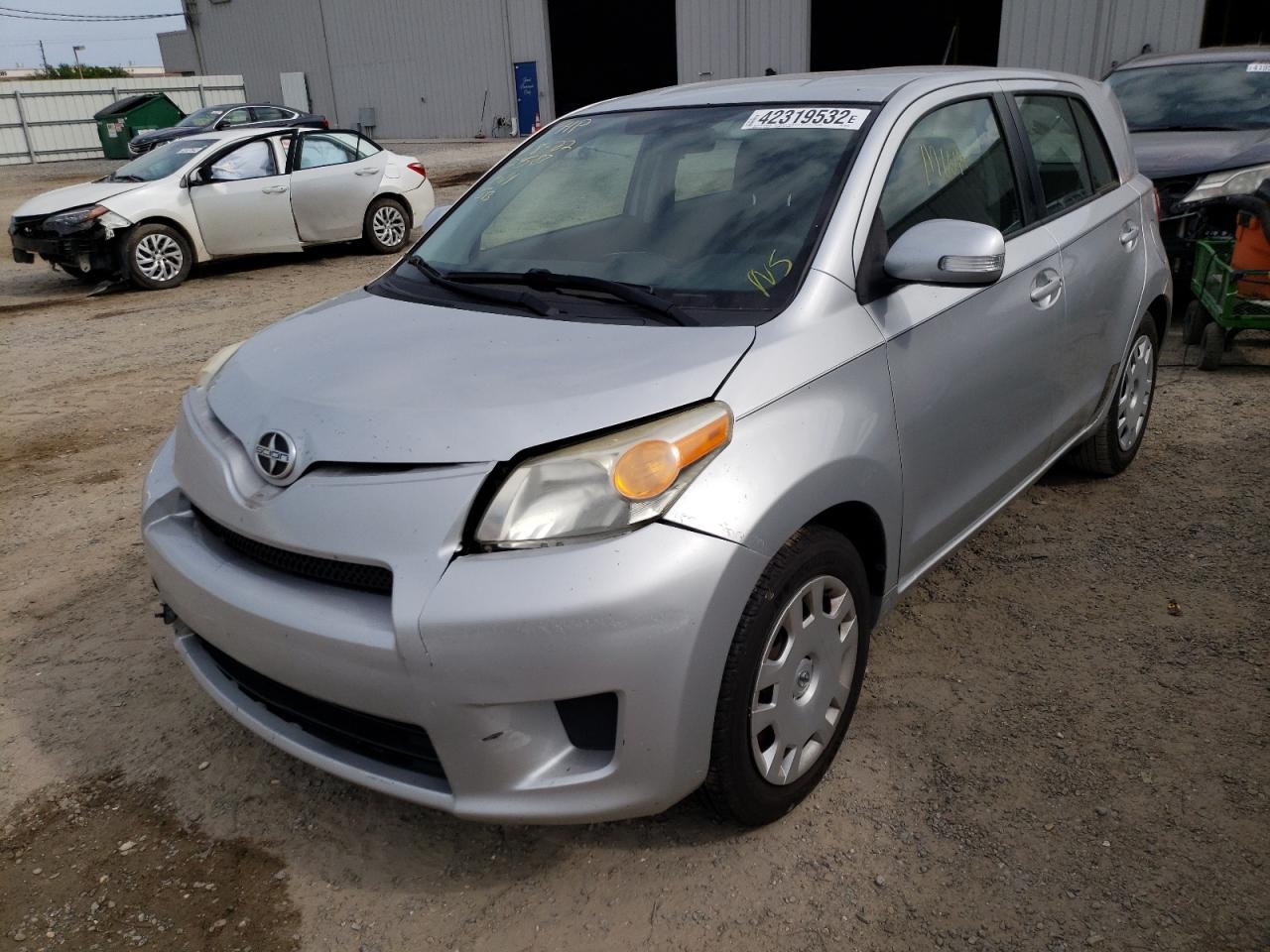 Photo 2 from auction – 2010 TOYOTA SCION XD with VIN JTKKU4B48A1002149
