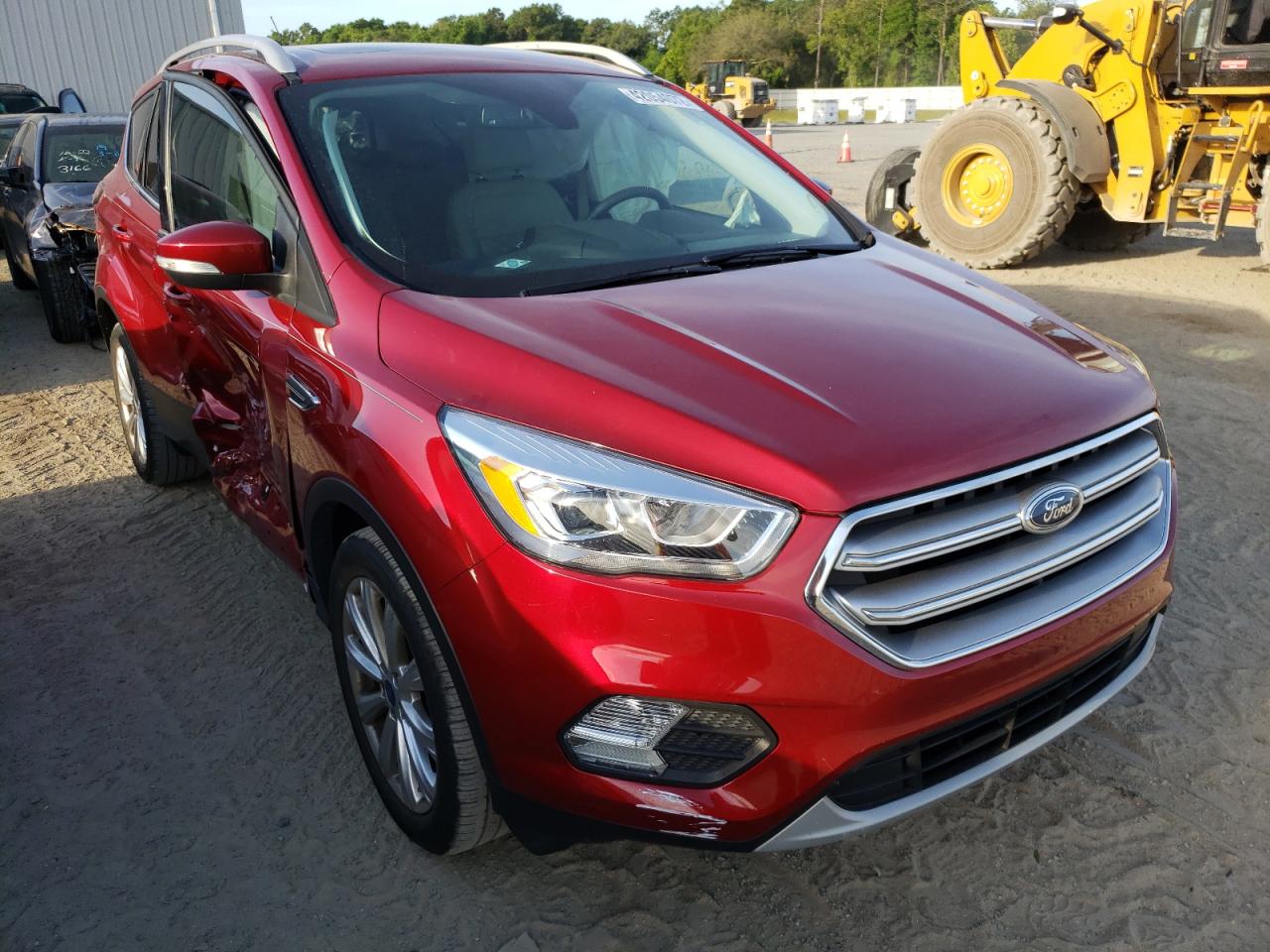 FORD ESCAPE TIT 2017 with VIN 1FMCU0J98HUB12334 - Photo from auction