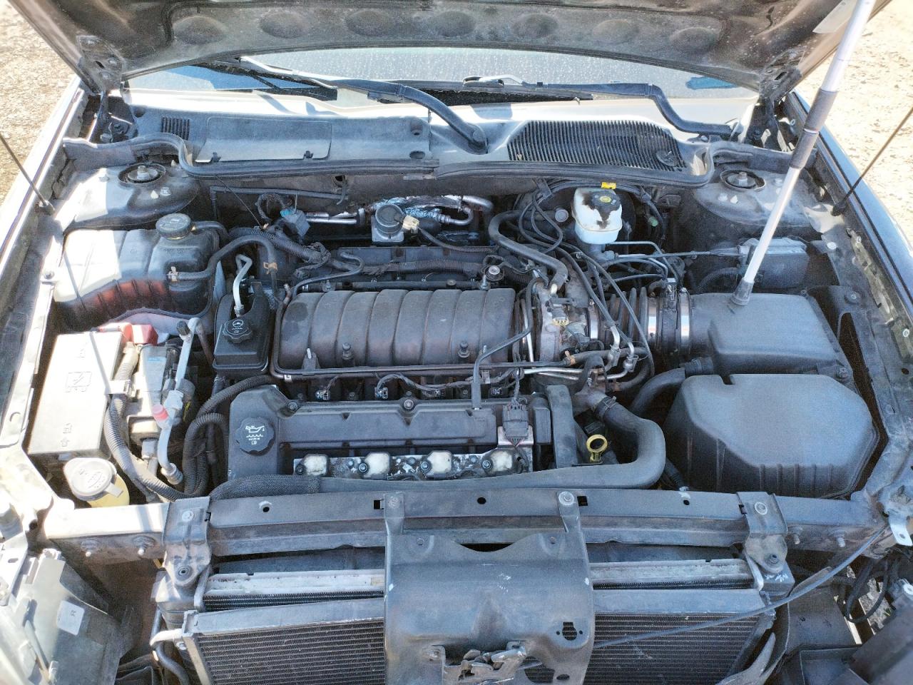 Photo 7 from auction – 2005 CADILLAC DEVILLE DT with VIN 1G6KF57935U140538