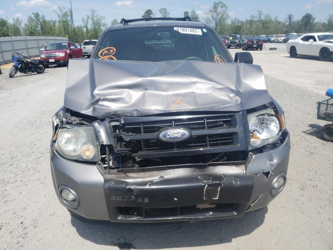 Photo 9 from auction – 2011 FORD ESCAPE XLT with VIN 1FMCU0DG8BKA78733