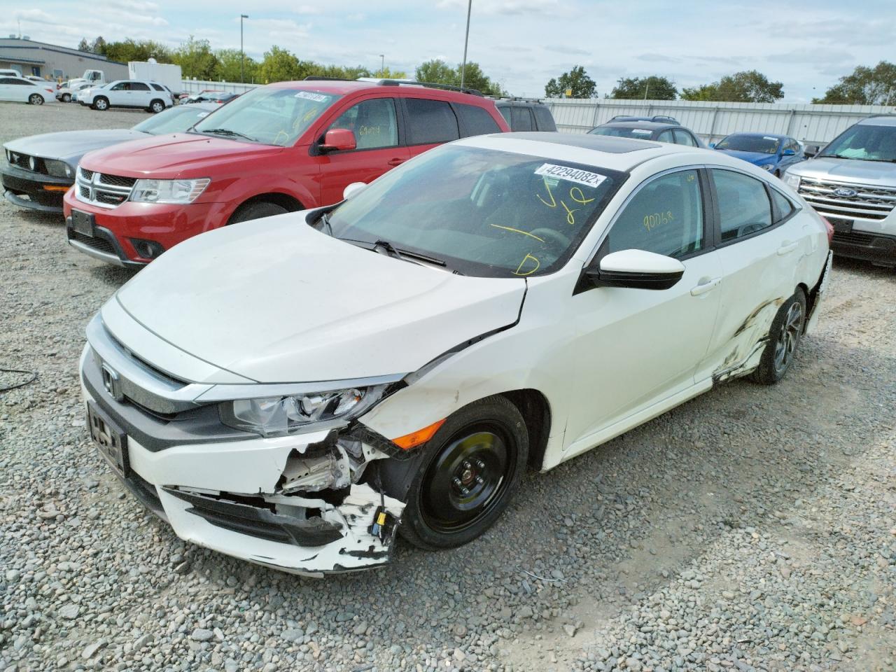 Photo 9 from auction – 2016 HONDA CIVIC EX with VIN 2HGFC2F72GH533699