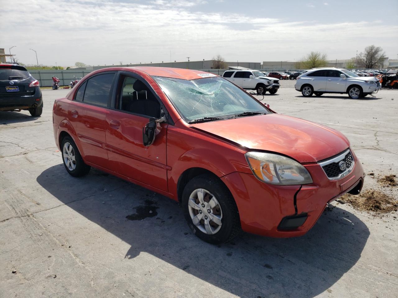 KIA RIO BASE 2011 with VIN KNADH4A37B6869444 - Photo from auction