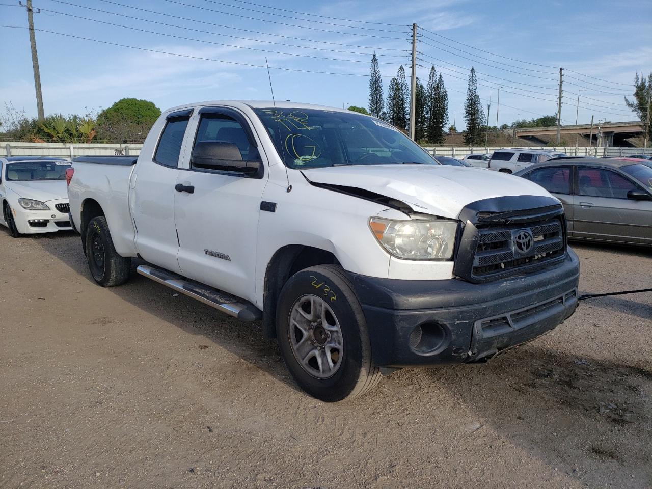 TOYOTA TUNDRA DOU 2010 with VIN 5TFRY5F12AX093576 - Photo from auction