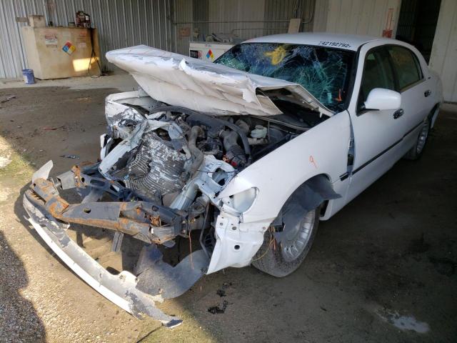 Photo 2 from auction – 2001 LINCOLN TOWN CAR E with VIN 1LNHM81W81Y732738