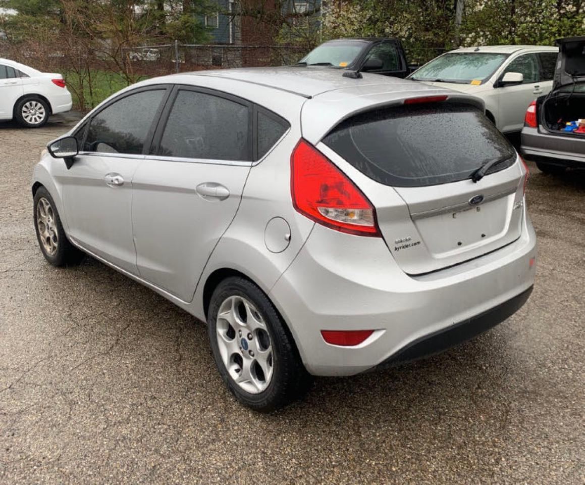 Photo 3 from auction – 2011 FORD FIESTA SES with VIN 3FADP4FJ9BM108935