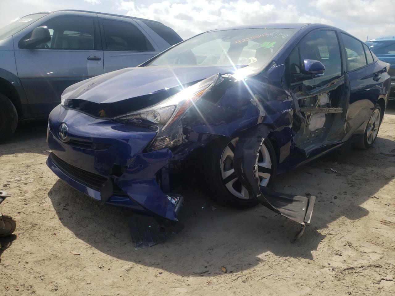 Photo 10 from auction – 2016 TOYOTA PRIUS with VIN JTDKARFU5G3506856