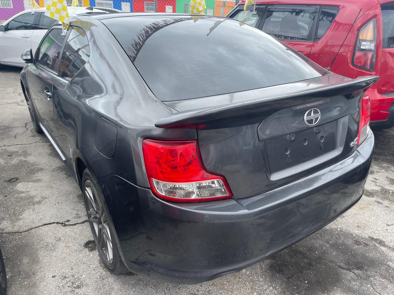 Photo 3 from auction – 2012 TOYOTA SCION TC with VIN JTKJF5C7XC3027632