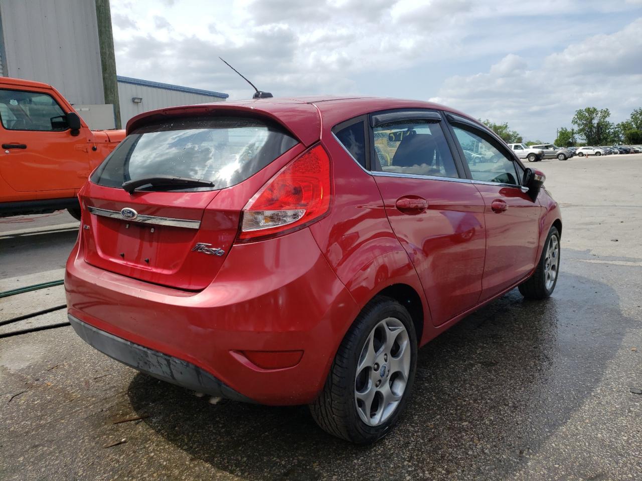 Photo 4 from auction – 2011 FORD FIESTA SES with VIN 3FADP4FJ0BM174841