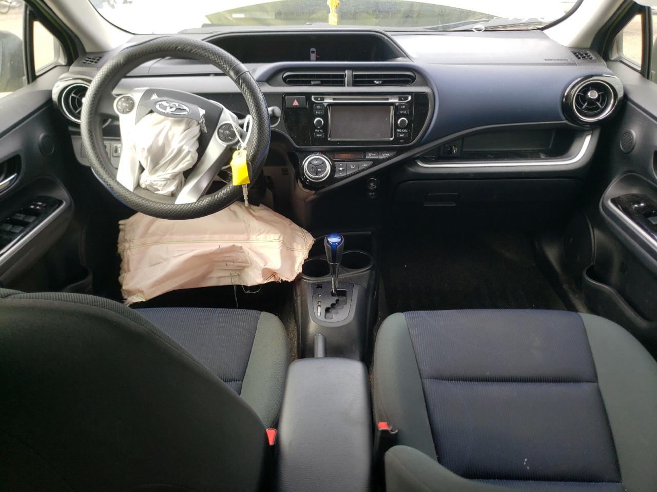 Photo 9 from auction – 2015 TOYOTA PRIUS C with VIN JTDKDTB37F1094824