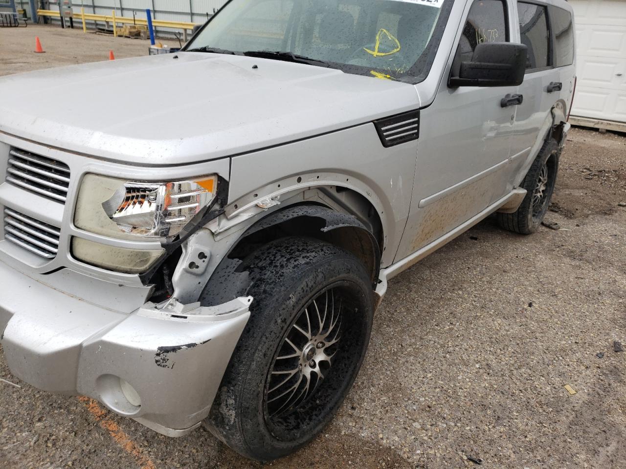 Photo 9 from auction – 2011 DODGE NITRO SXT with VIN 1D4PU5GK0BW574057