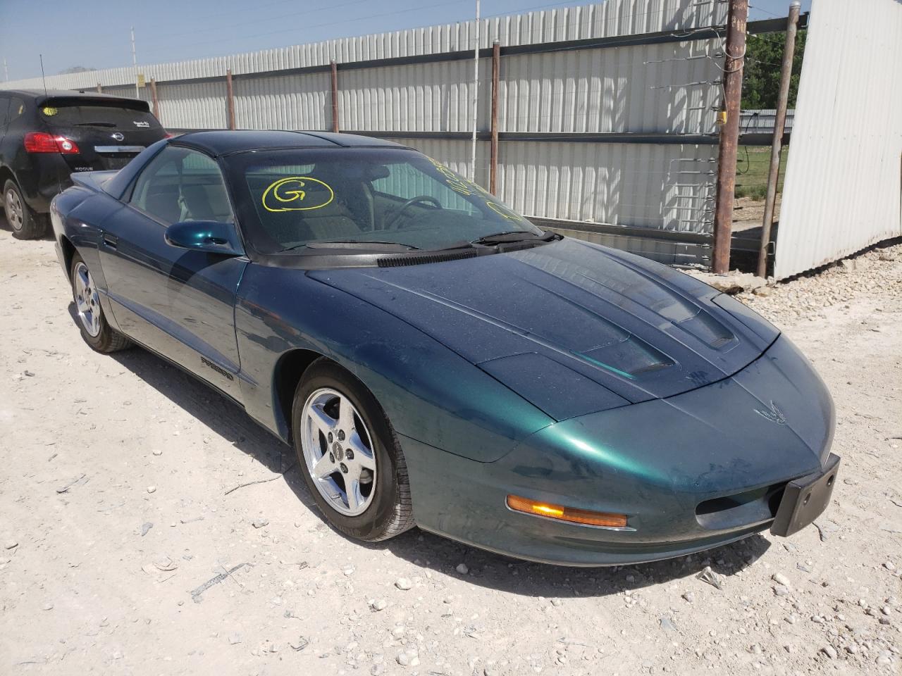 PONTIAC FIREBIRD 1997 with VIN 2G2FS22K9V2216034 - Photo from auction