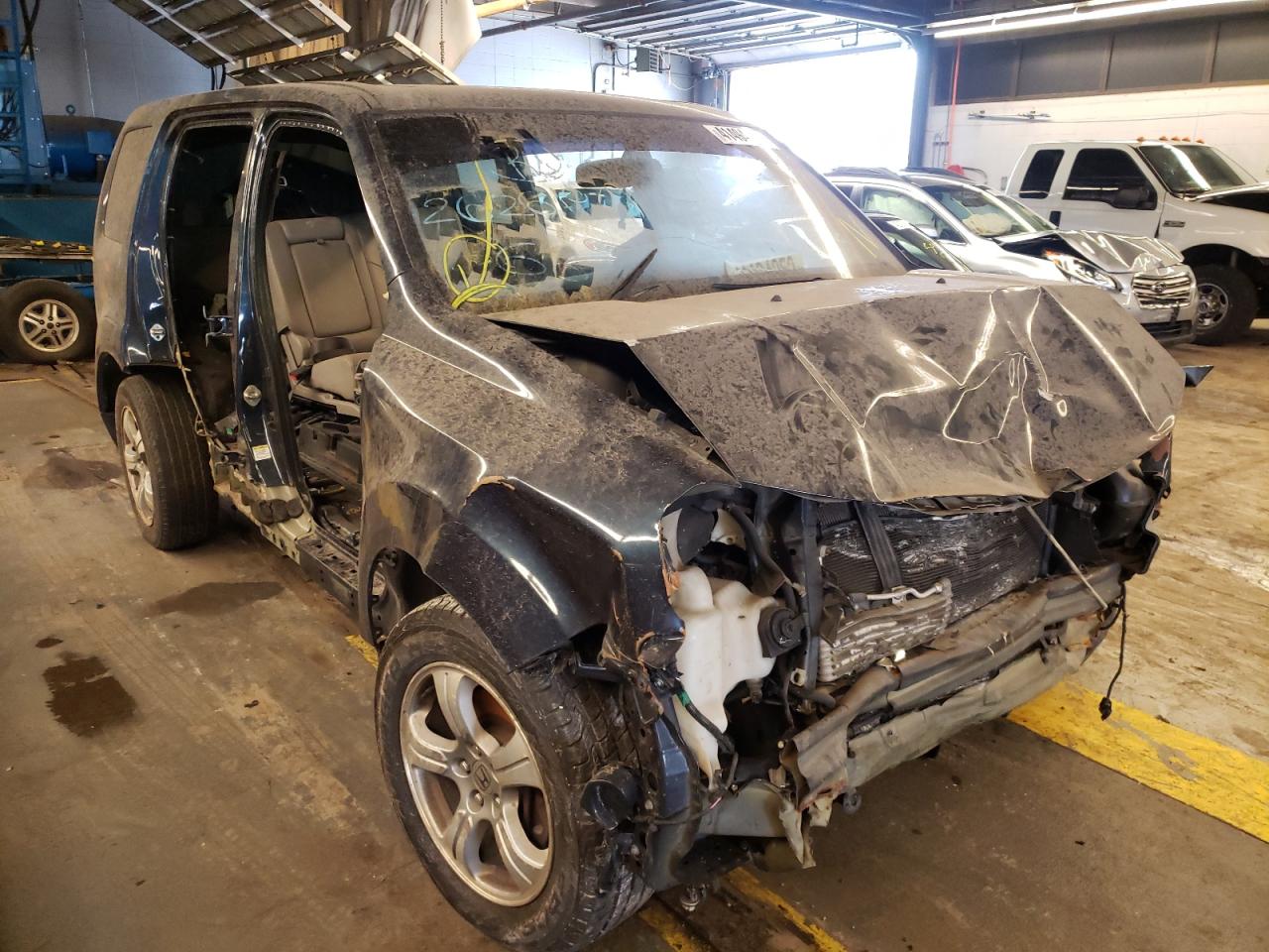 HONDA PILOT EXL 2012 with VIN 5FNYF4H57CB037349 - Photo from auction