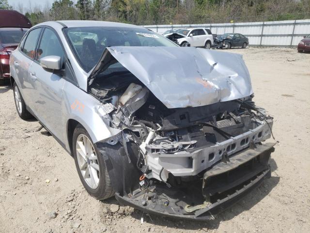 FORD FOCUS SE 2017 with VIN 1FADP3F21HL323206 - Photo from auction