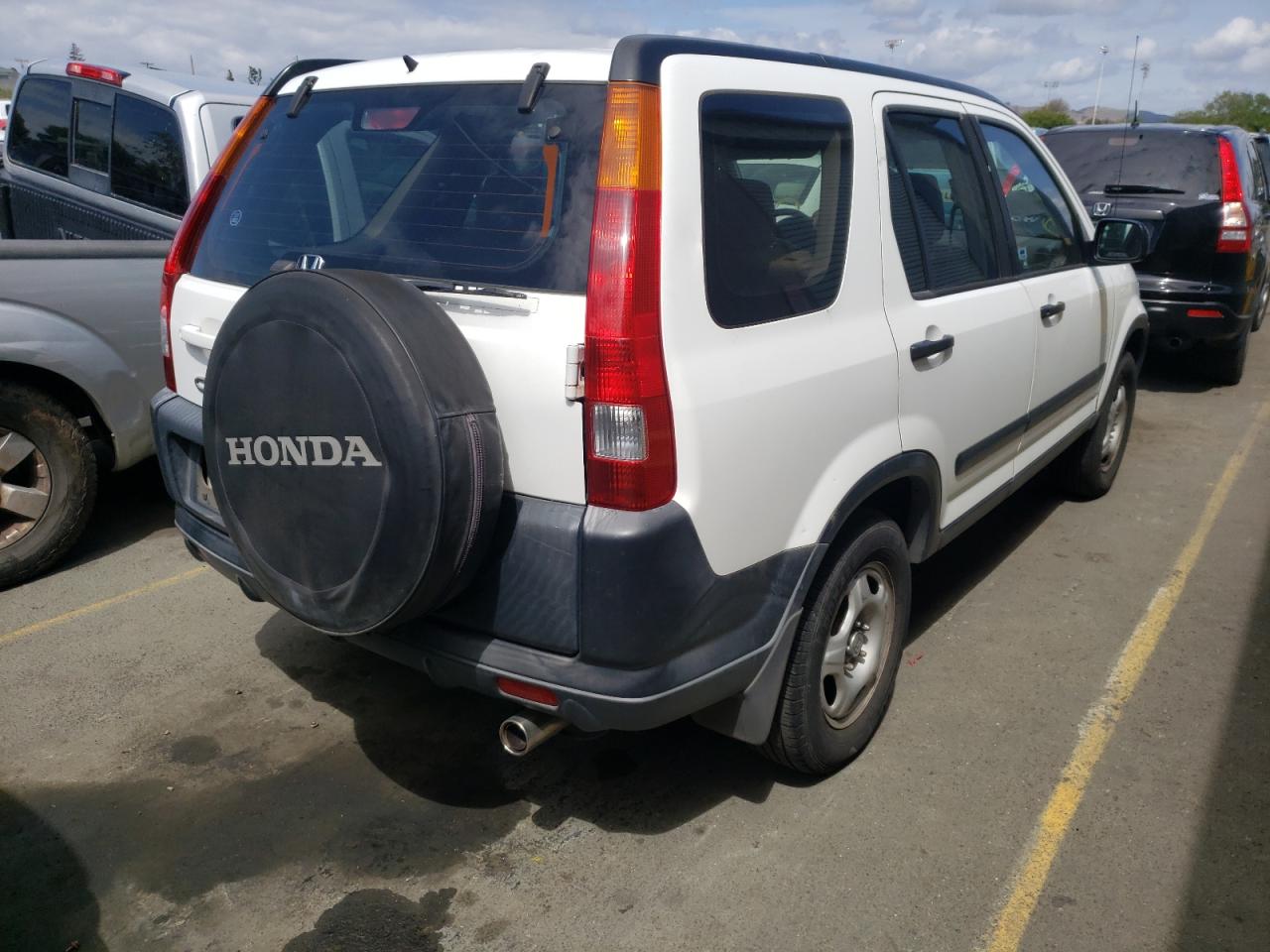 Photo 17 from auction – 2002 HONDA CR-V LX with VIN JHLRD68452C019220