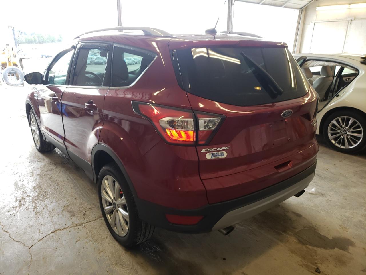 Photo 3 from auction – 2017 FORD ESCAPE TIT with VIN 1FMCU9J99HUA35896