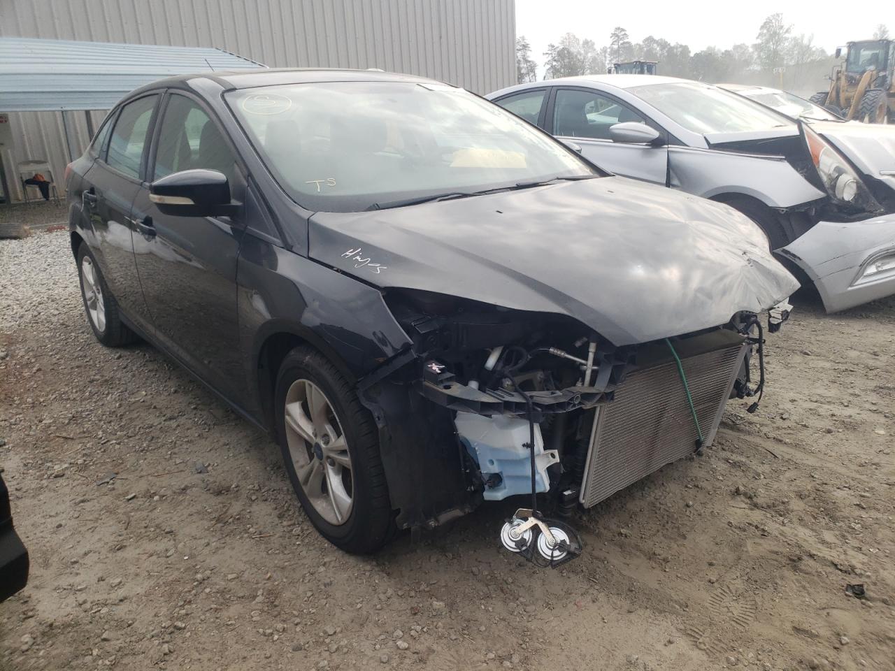 FORD FOCUS SE 2014 with VIN 1FADP3F21EL435726 - Photo from auction