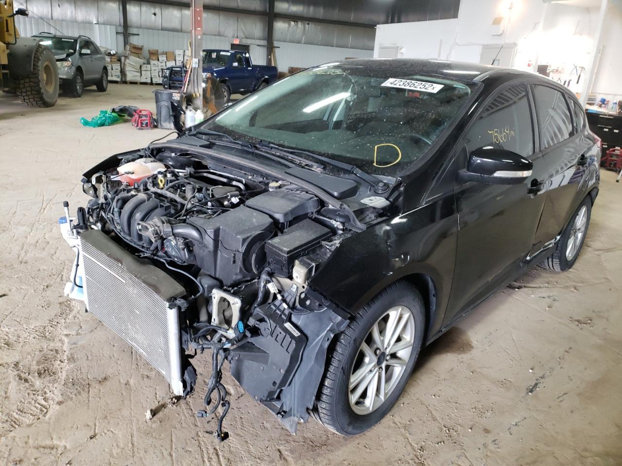 Photo 2 from auction – 2015 FORD FOCUS with VIN 1FADP3K27FL375118