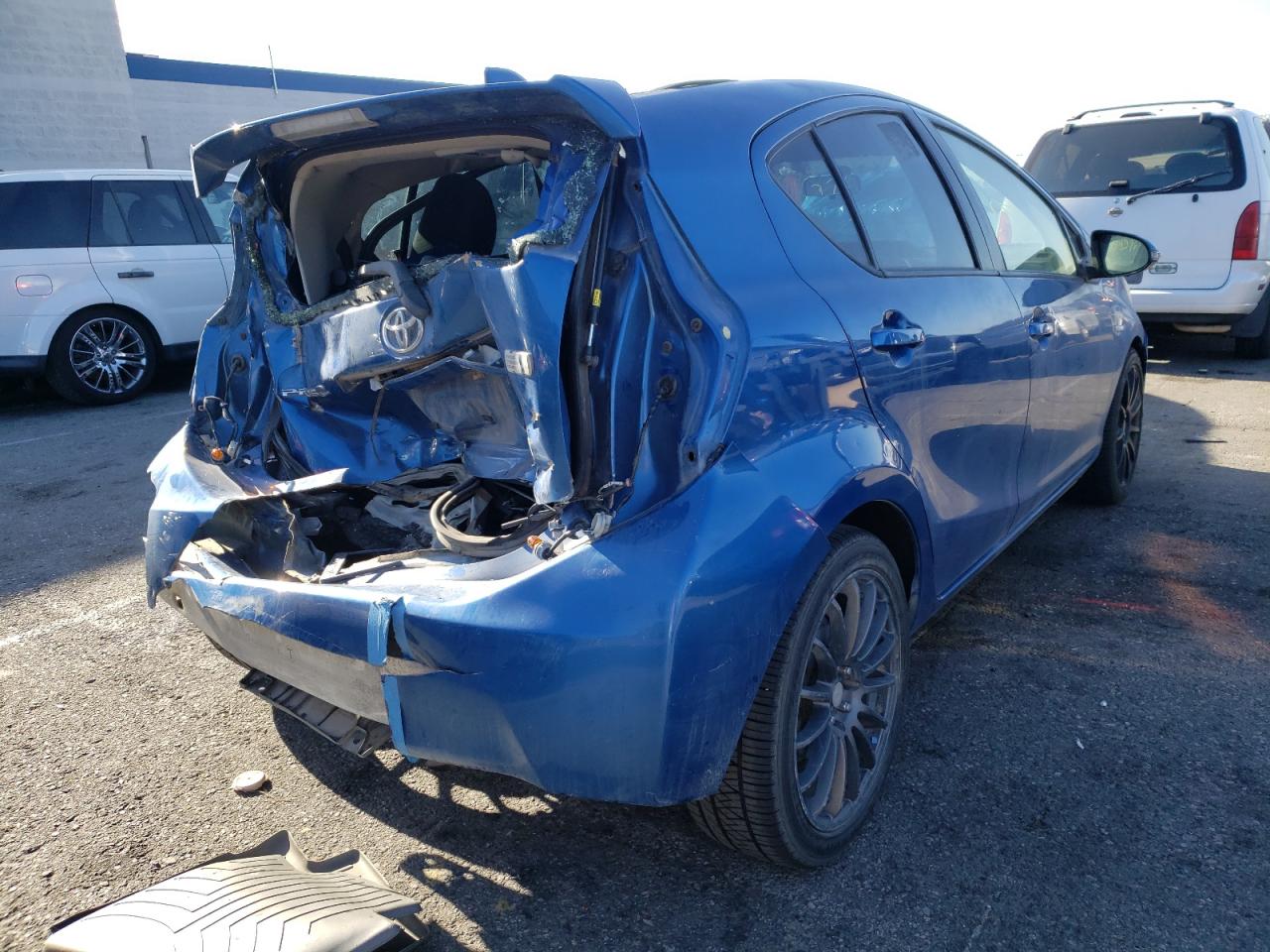 Photo 4 from auction – 2015 TOYOTA PRIUS C with VIN JTDKDTB34F1107206