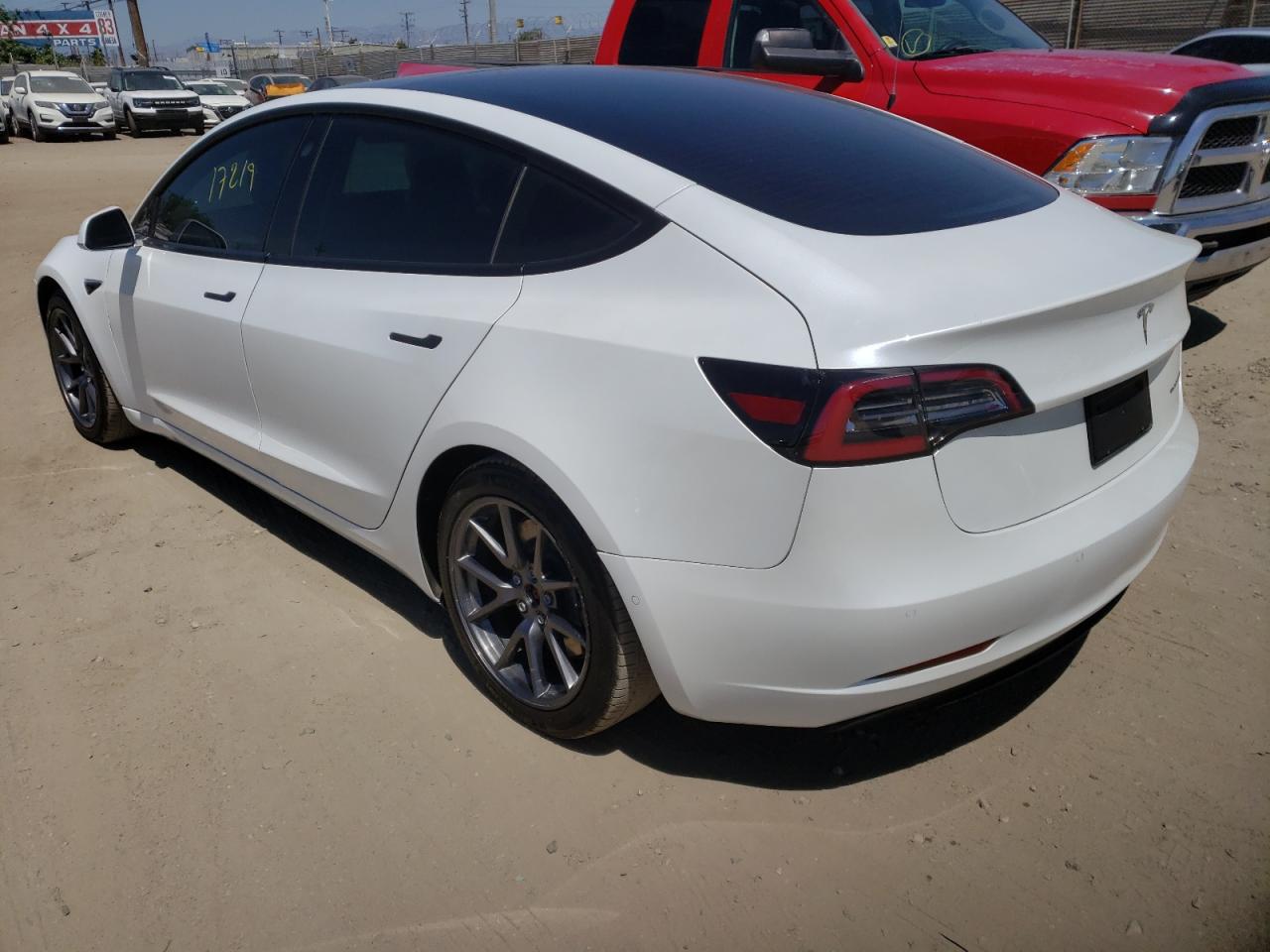 Photo 3 from auction – 2021 TESLA MODEL 3 with VIN 5YJ3E1EB7MF869653