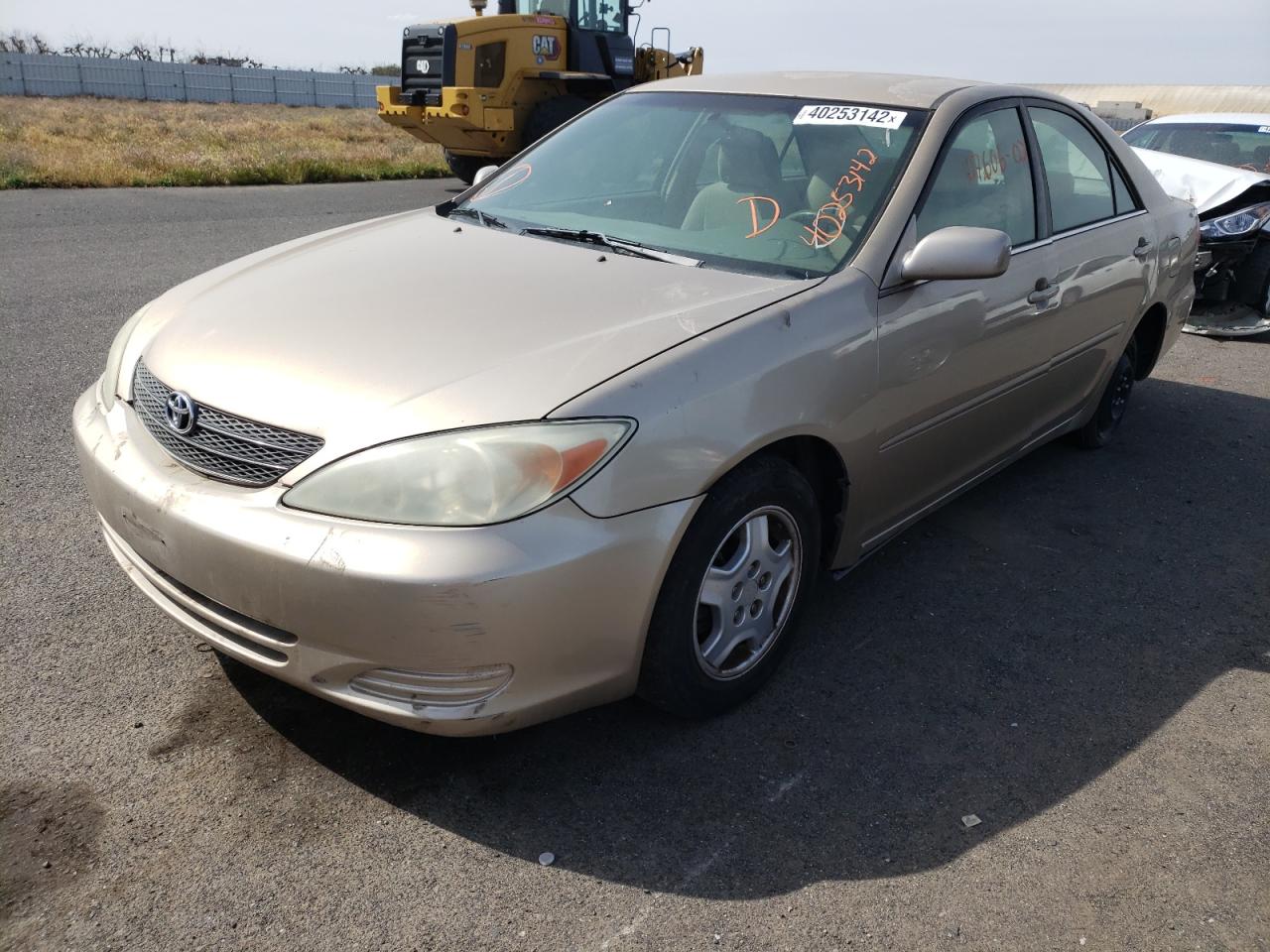 Photo 2 from auction – 2002 TOYOTA CAMRY LE with VIN 4T1BF30K22U026651