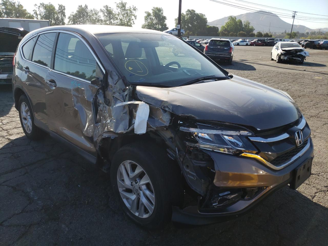 HONDA CR-V EX 2015 with VIN 3CZRM3H55FG701080 - Photo from auction