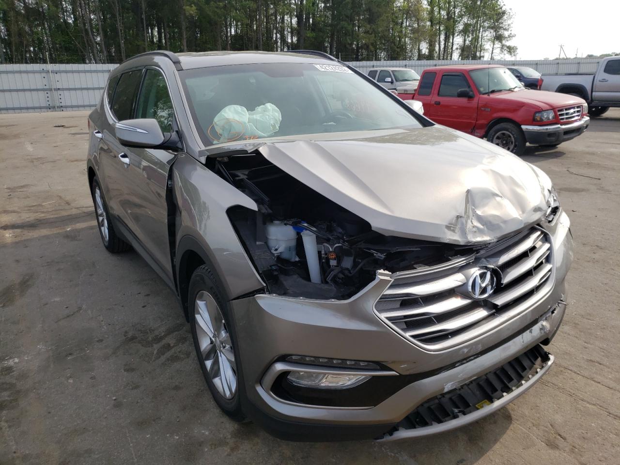 HYUNDAI SANTA FE S 2018 with VIN 5NMZU4LA0JH060790 - Photo from auction
