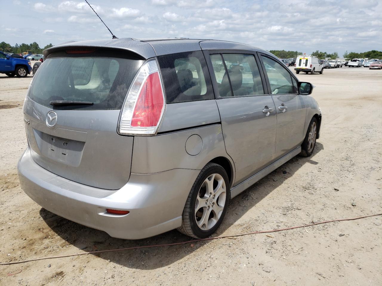 Photo 4 from auction – 2010 MAZDA 5 with VIN JM1CR2W36A0364960