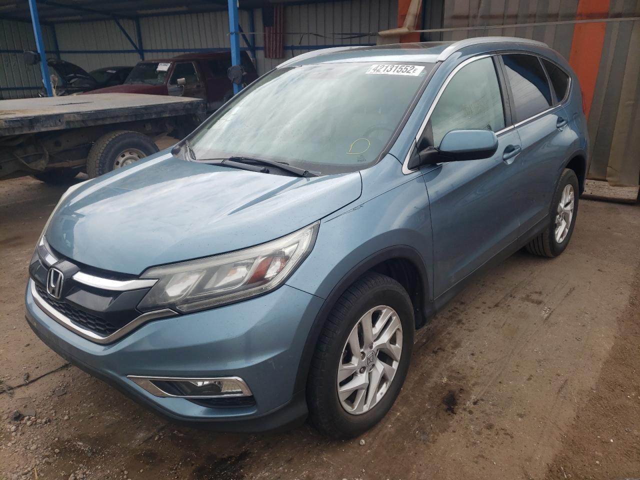 Photo 2 from auction – 2015 HONDA CR-V EXL with VIN 2HKRM4H79FH686555