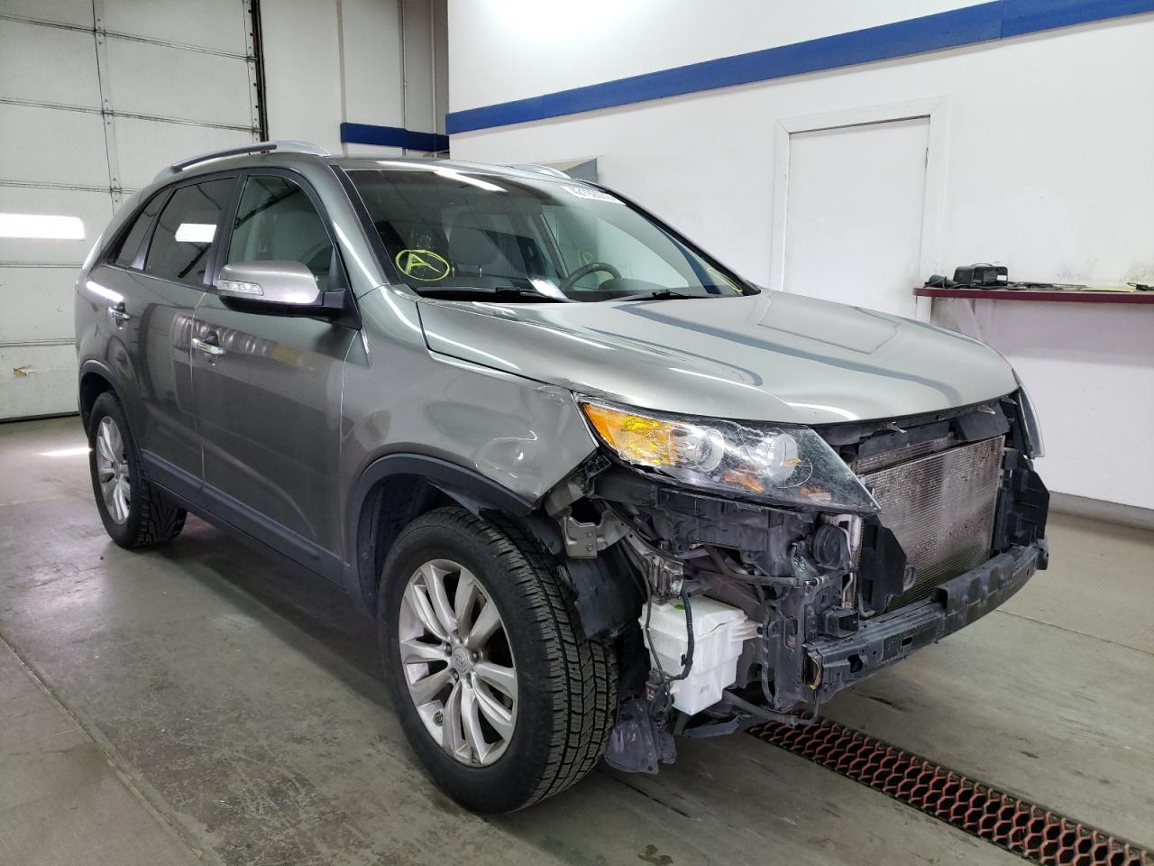 KIA SORENTO BA 2011 with VIN 5XYKT4A25BG049974 - Photo from auction