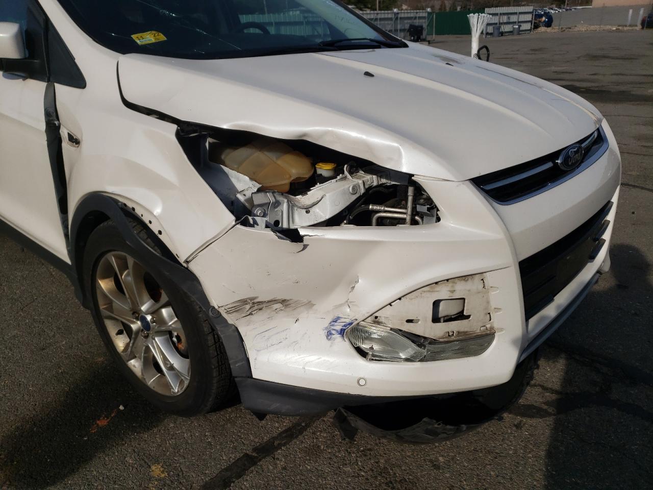 Photo 9 from auction – 2014 FORD ESCAPE TIT with VIN 1FMCU9J95EUA88221