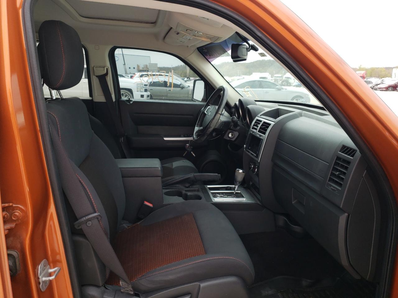 Photo 5 from auction – 2011 DODGE NITRO DETO with VIN 1D4PU6GX0BW590521