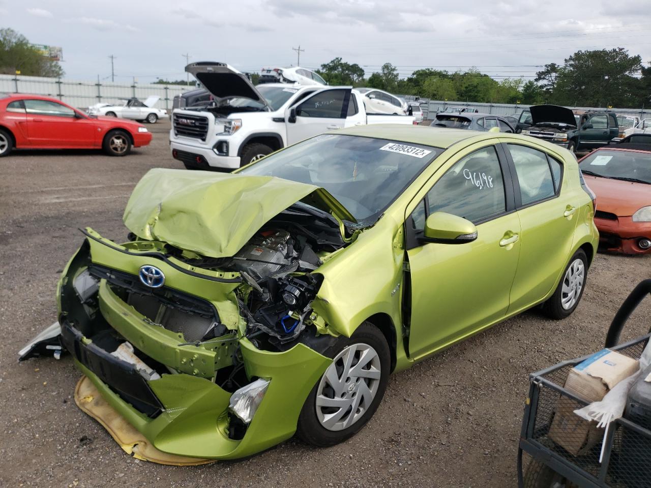 Photo 2 from auction – 2015 TOYOTA PRIUS C with VIN JTDKDTB37F1094824