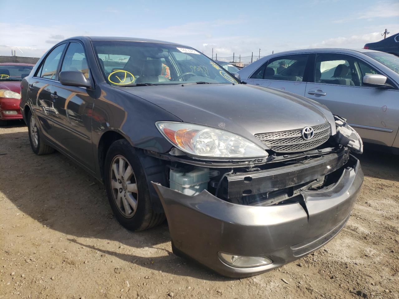 TOYOTA CAMRY LE 2003 with VIN 4T1BF30K43U564219 - Photo from auction