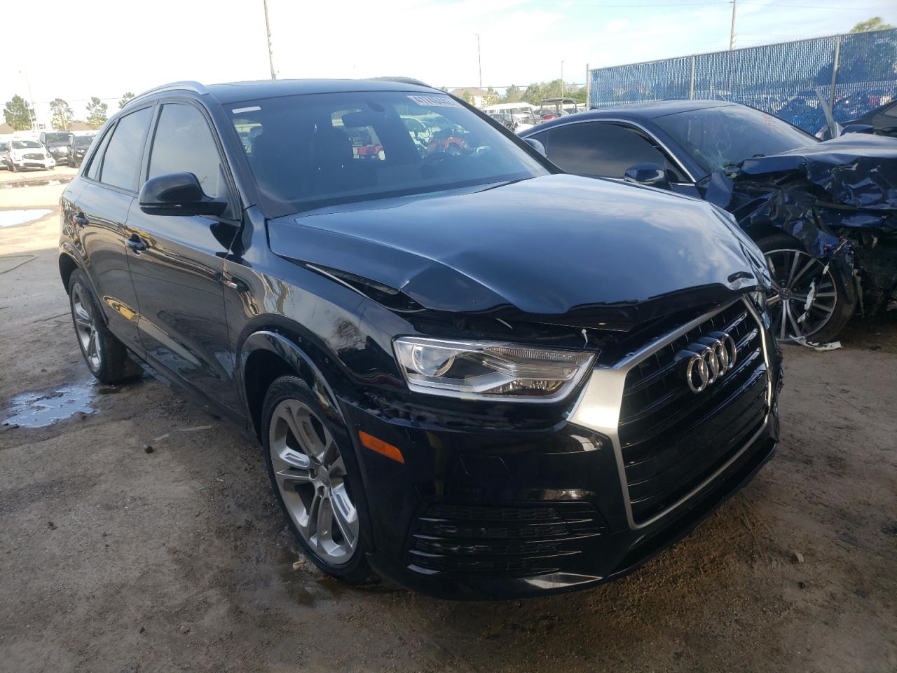 AUDI Q3 PREMIUM 2018 with VIN WA1BCCFS1JR000462 - Photo from auction