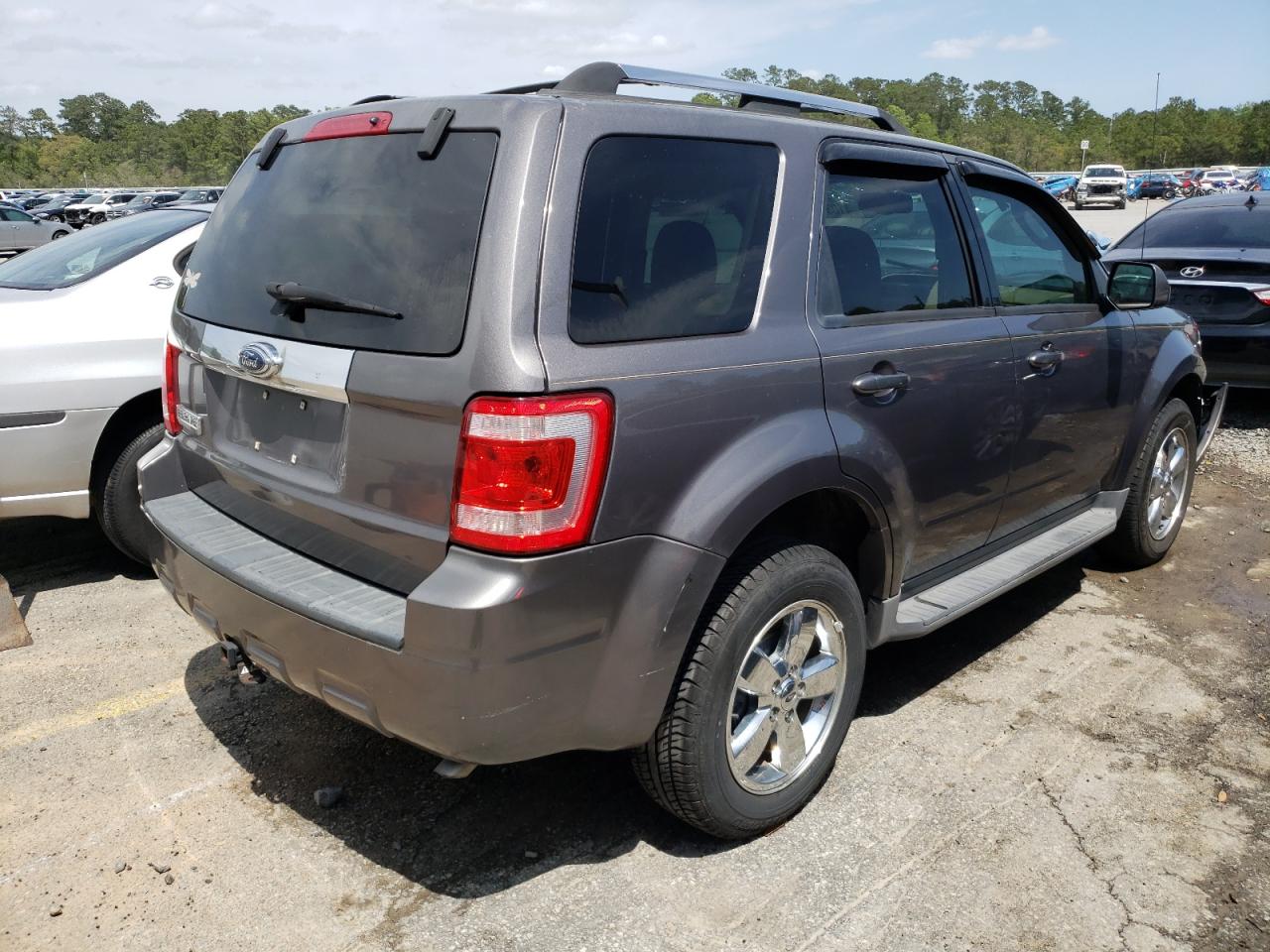 Photo 4 from auction – 2009 FORD ESCAPE LIM with VIN 1FMCU04G99KC04592