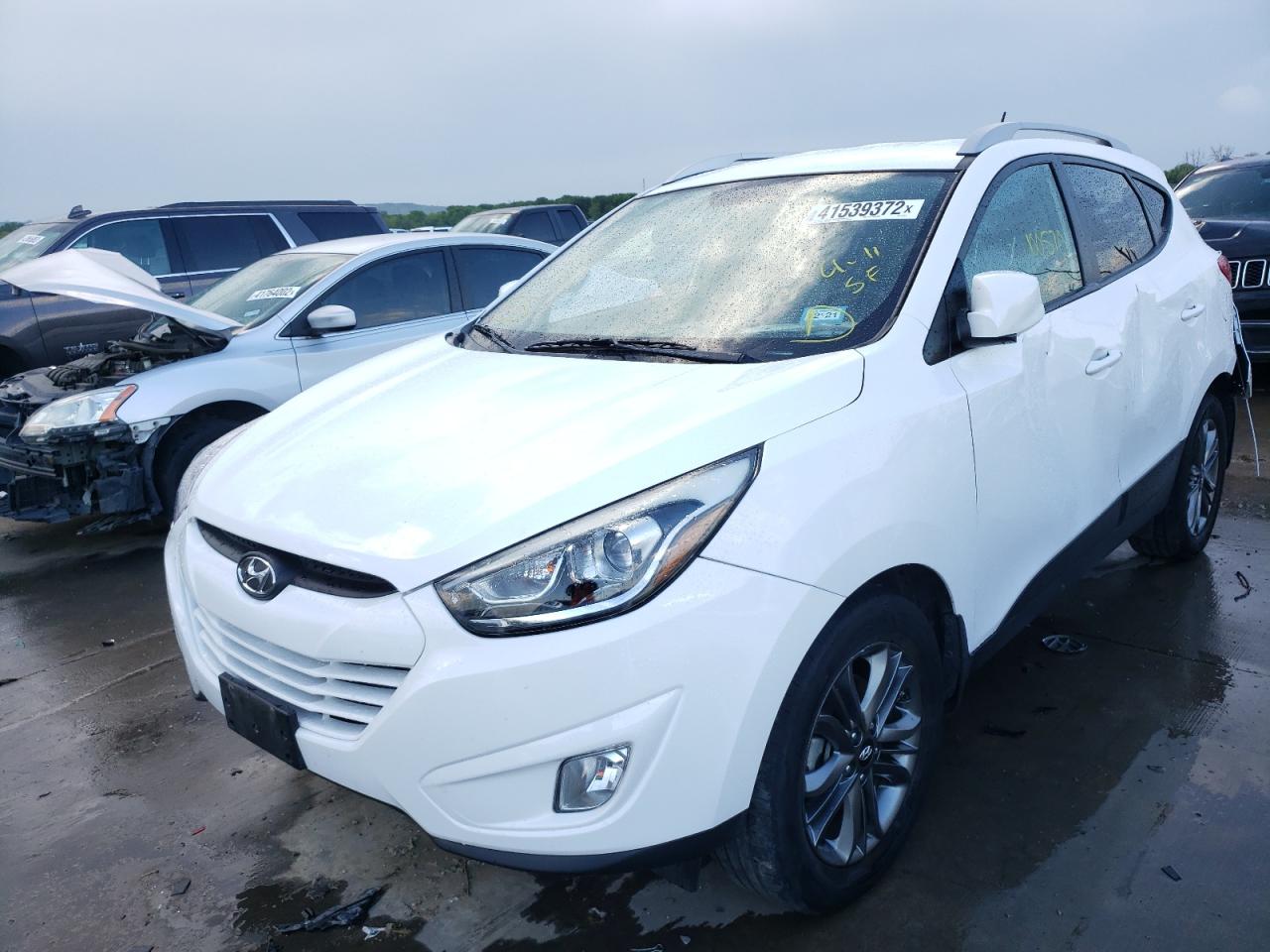 Photo 2 from auction – 2014 HYUNDAI TUCSON GLS with VIN KM8JUCAG7EU871267