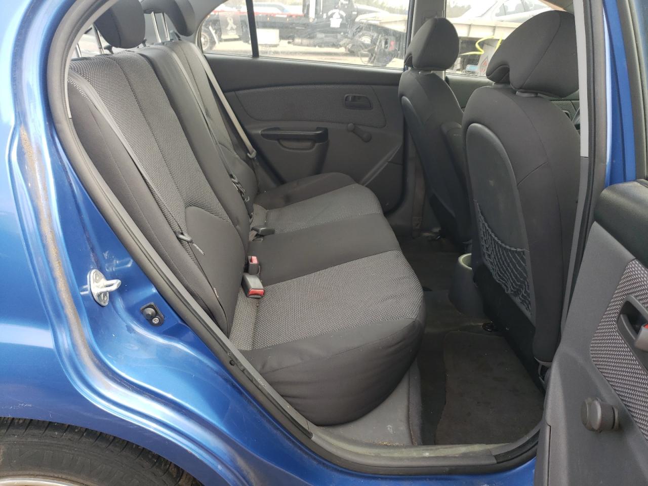 Photo 6 from auction – 2010 KIA RIO LX with VIN KNADH4A34A6635051