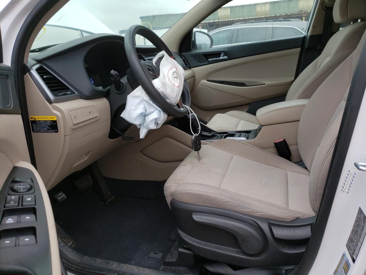 Photo 9 from auction – 2016 HYUNDAI TUCSON SE with VIN KM8J23A45GU112504