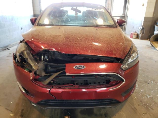 Foto 7 de la subasta – 2017 FORD FOCUS SEL con VIN 1FADP3H29HL331874