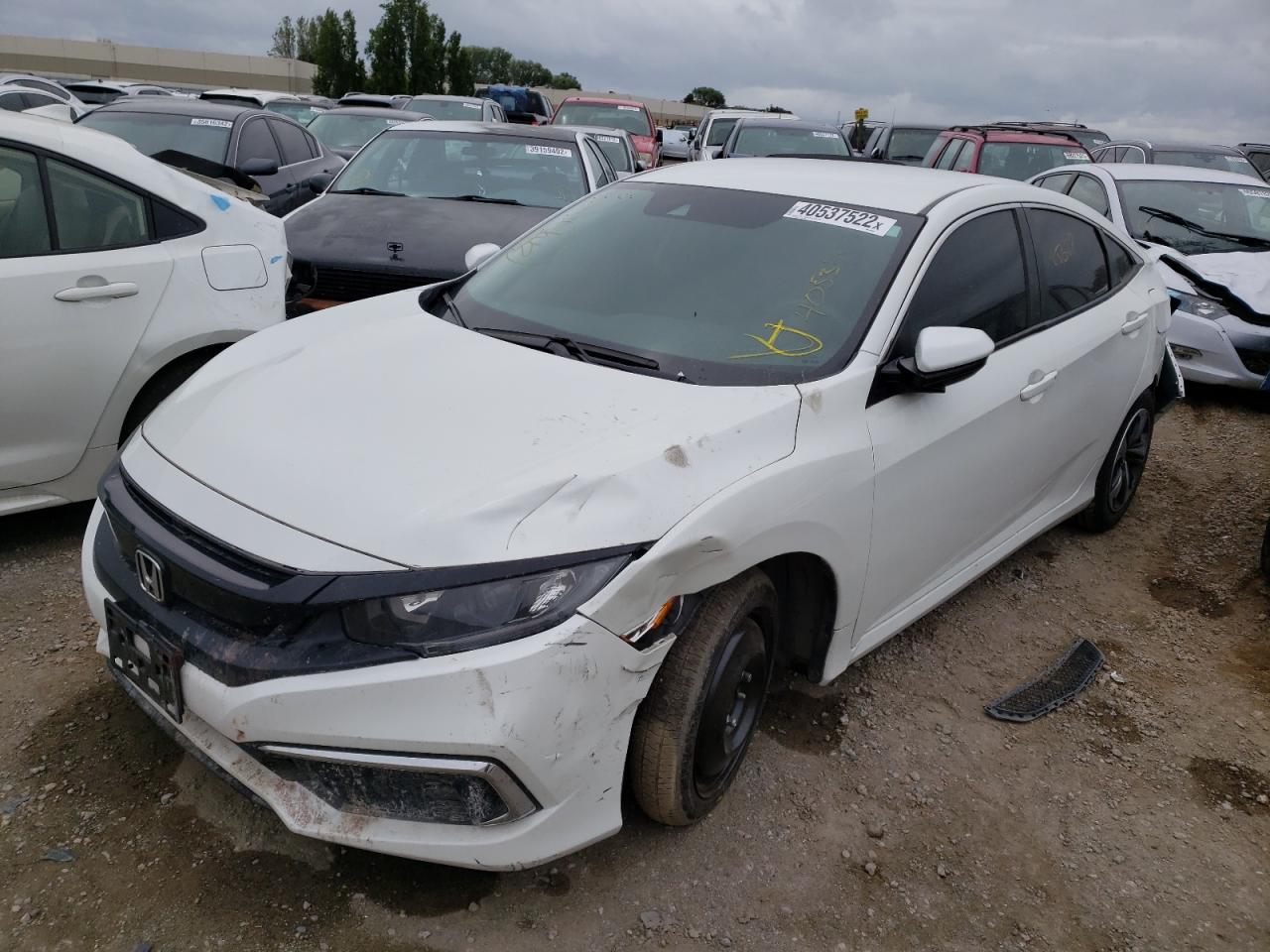 Photo 2 from auction – 2019 HONDA CIVIC LX with VIN 19XFC2E69KE043644