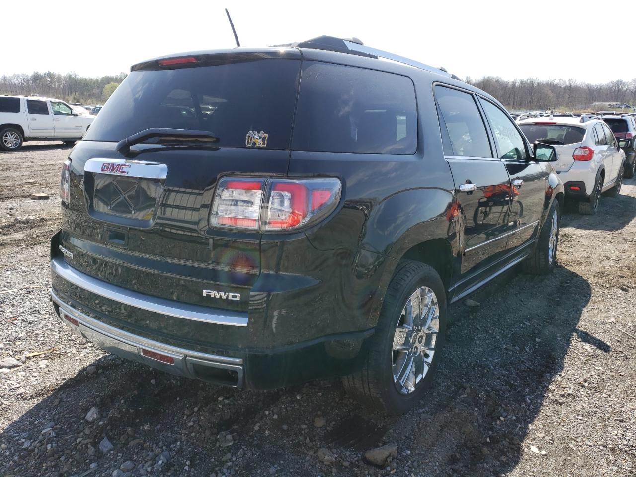 Photo 4 from auction – 2016 GMC ACADIA DEN with VIN 1GKKVTKD3GJ321132