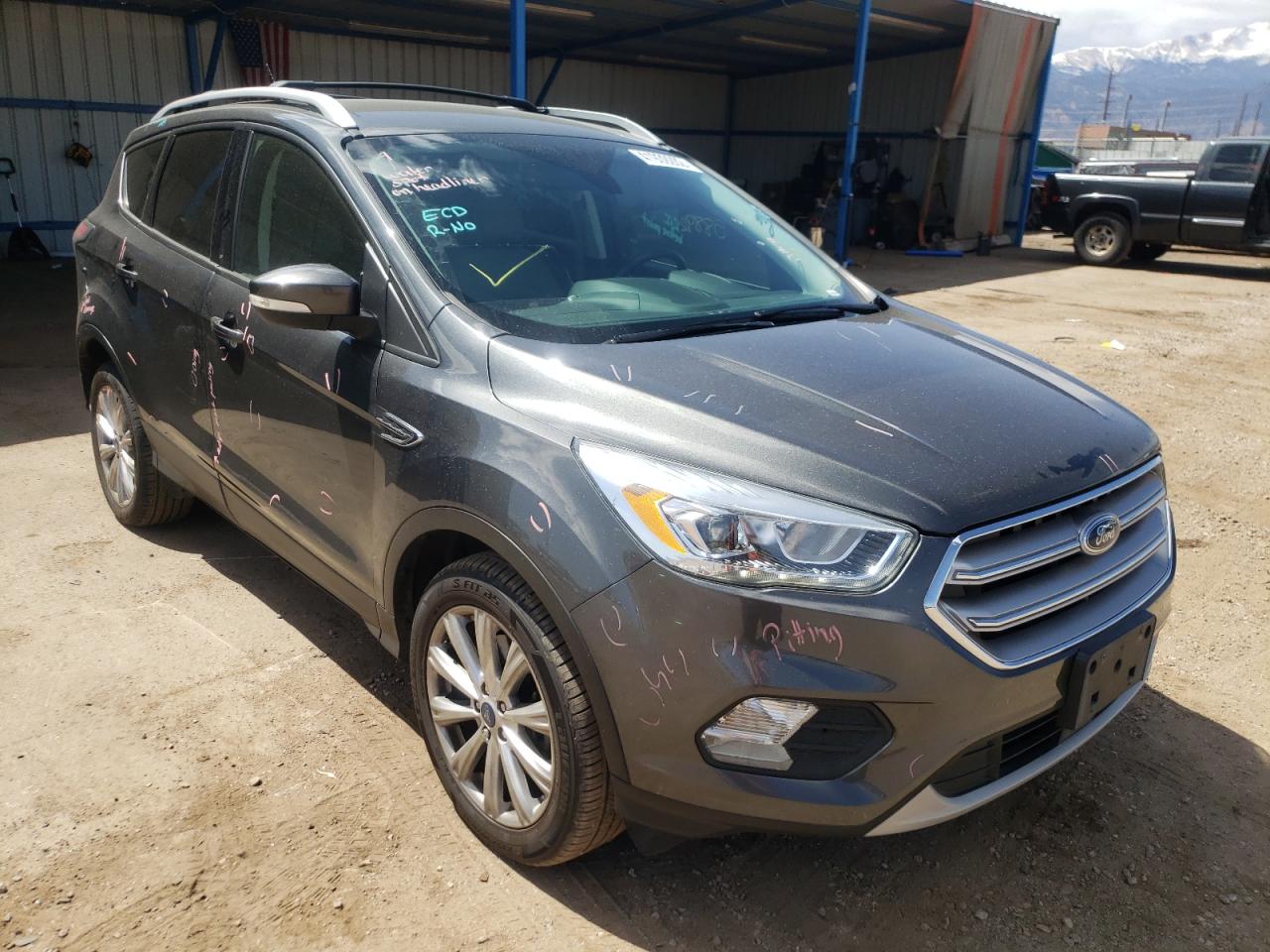 FORD ESCAPE TIT 2017 with VIN 1FMCU9J97HUA14366 - Photo from auction