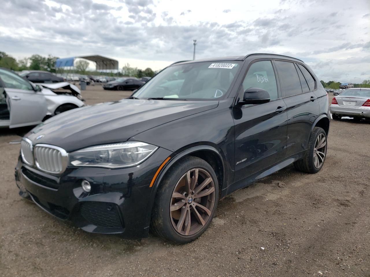 Photo 2 from auction – 2014 BMW X5 XDRIVE5 with VIN 5UXKR6C52E0C02145