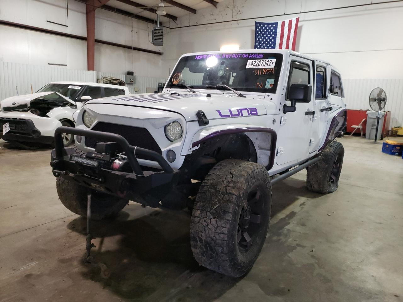 Photo 2 from auction – 2014 JEEP WRANGLER U with VIN 1C4BJWDG0EL311854