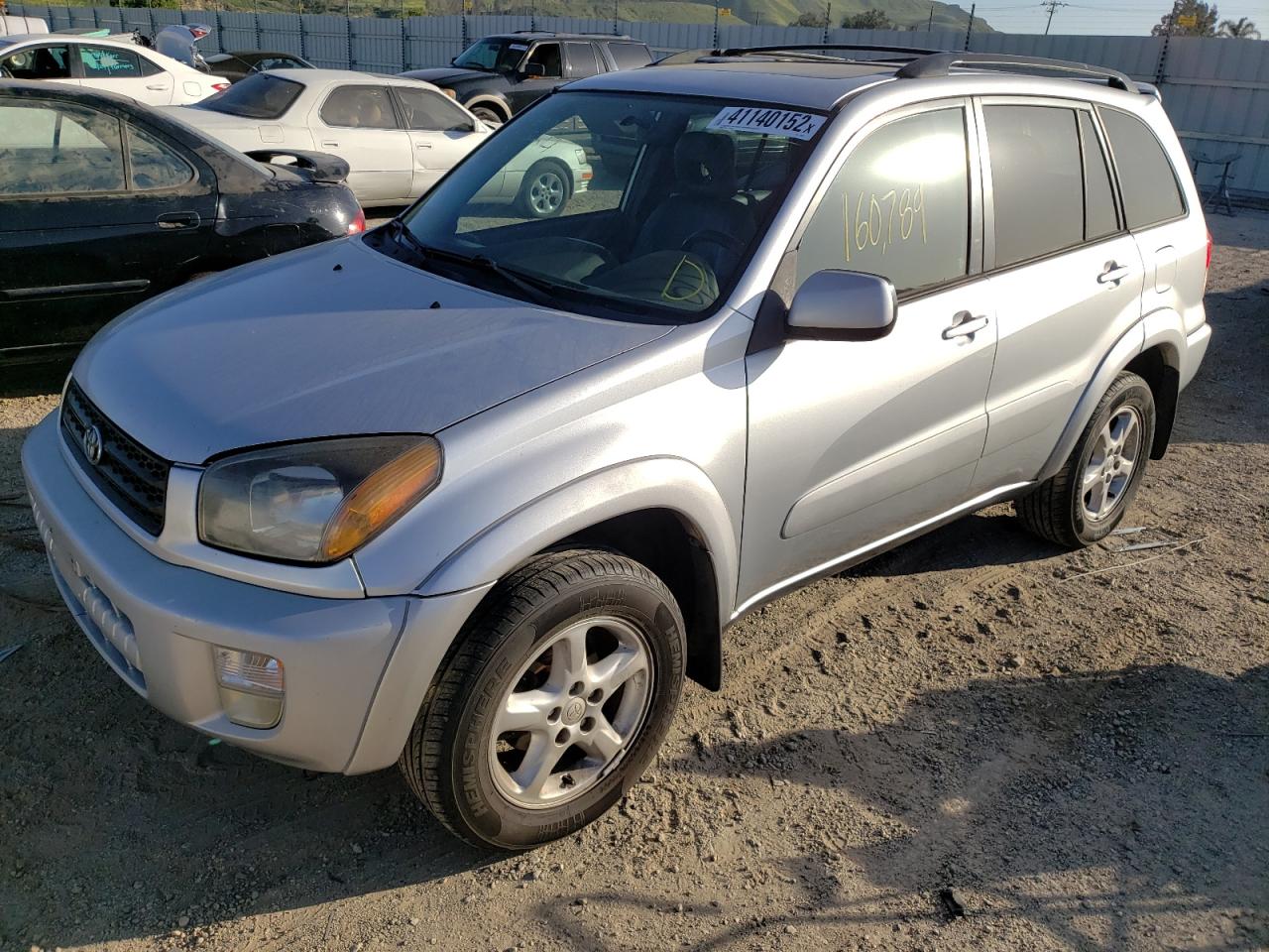 Photo 2 from auction – 2001 TOYOTA RAV4 with VIN JTEHH20V810124694